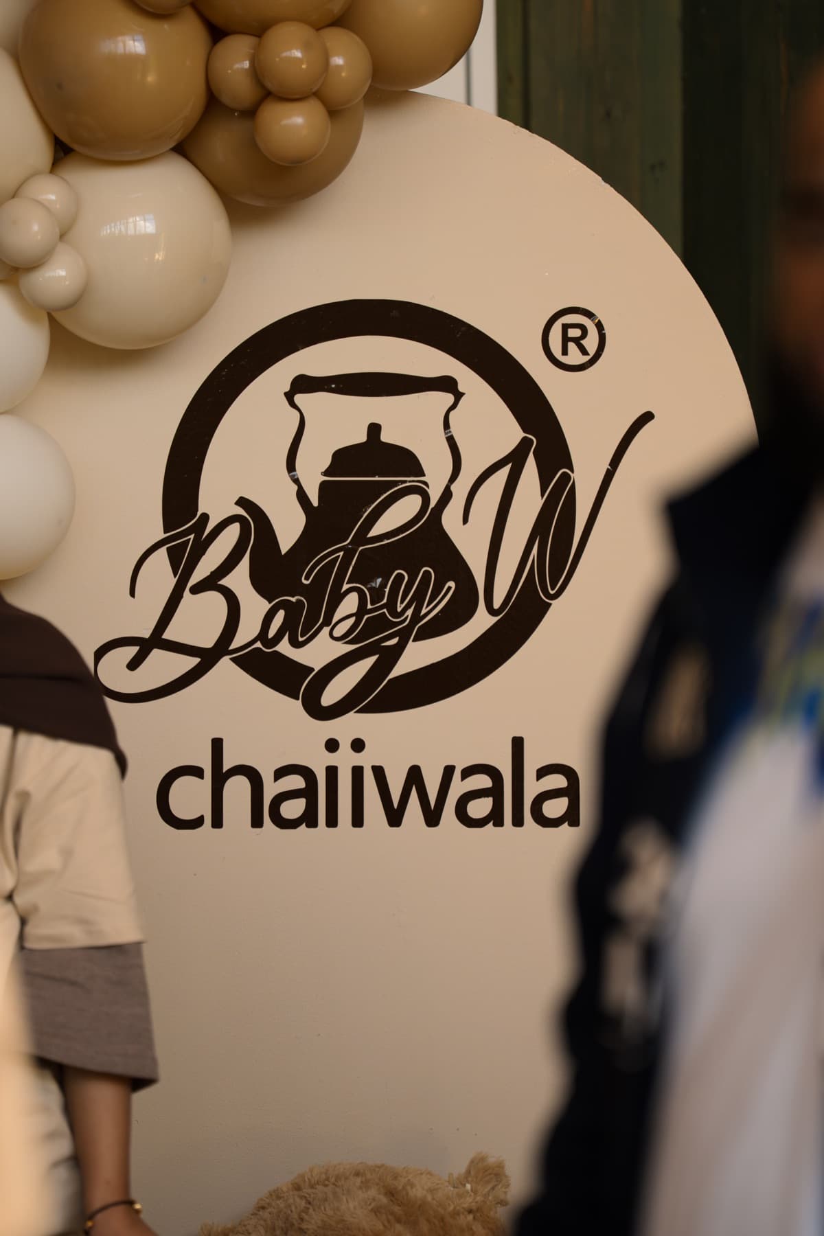 a chaiiwala events spread with karak cups, samosas and naan wraps