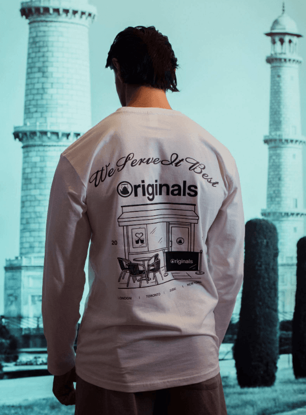 A team member wearing a chaiiwala originals tee